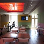 Vua dining area, digital screen combining TV and ads