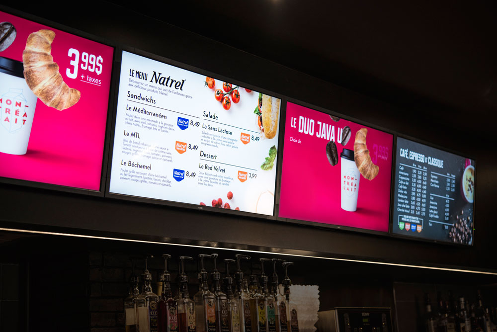 Digital menu boards at the Natrel Milk Bar by java u. 